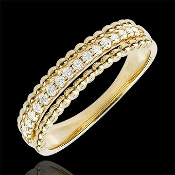 Anillo Flor de Sal - dos aros - oro amarillo 18 quilates