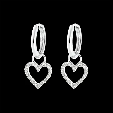 Une paire de boucle d'oreille Mix en or blanc 18 carats
