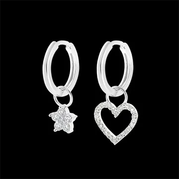 Une paire de boucle d'oreille Mix en or blanc 18 carats