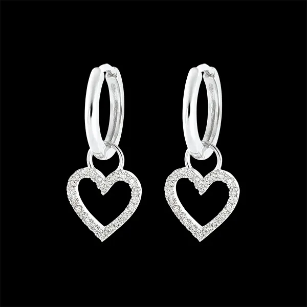 Une paire de boucle d'oreille Mix en or blanc 9 carats