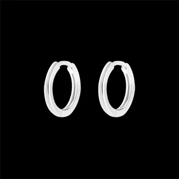 Une paire de boucle d'oreille Mix en or blanc 9 carats