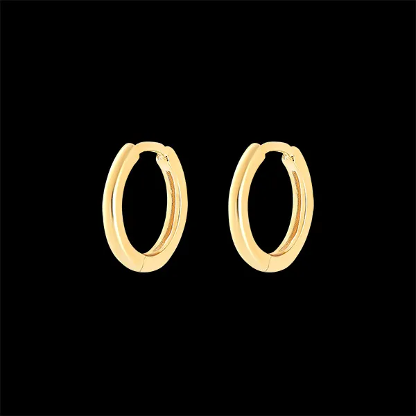 Une paire de boucle d'oreille Mix en or jaune 9 carats
