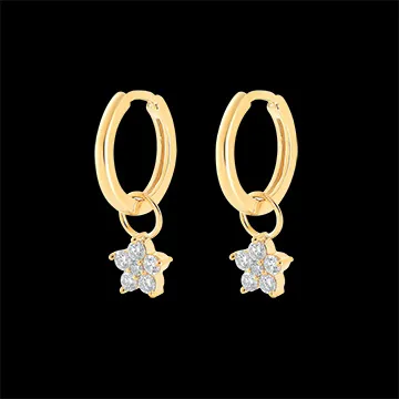 Un par de pendientes Combinados en oro amarillo 9 quilates