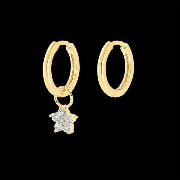 Un par de pendientes Combinados en oro amarillo 9 quilates