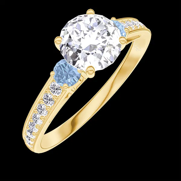 « L'Atelier » Nº262684 - Ring Gelbgold 750/-(18Kt) - Labordiamant rund 0.7 Karat - Seitliche Steine Blauer Topas - Fassung Labordiamant