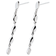 Boucles d'oreilles douce flore or blanc 18 carats.
