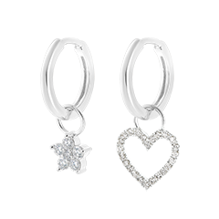 Une paire de boucle d'oreille Mix en or blanc 18 carats Une paire de boucle d'oreille Mix en or blanc 18 carats