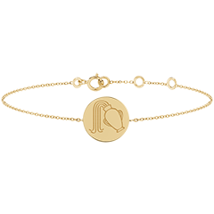 Brazalete con medalla grabada redonda - Aquarius - Oro amarillo de 9 quilates - Colección Zodiac Yours - Edenly Yours
